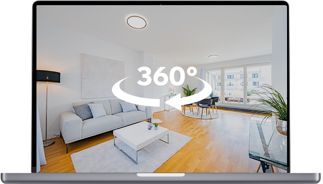 Laptop zeigt virtuellen 360°-Rundgang durch eine modern eingerichtete Wohnung – interaktive Online-Besichtigung von Immobilien in München.